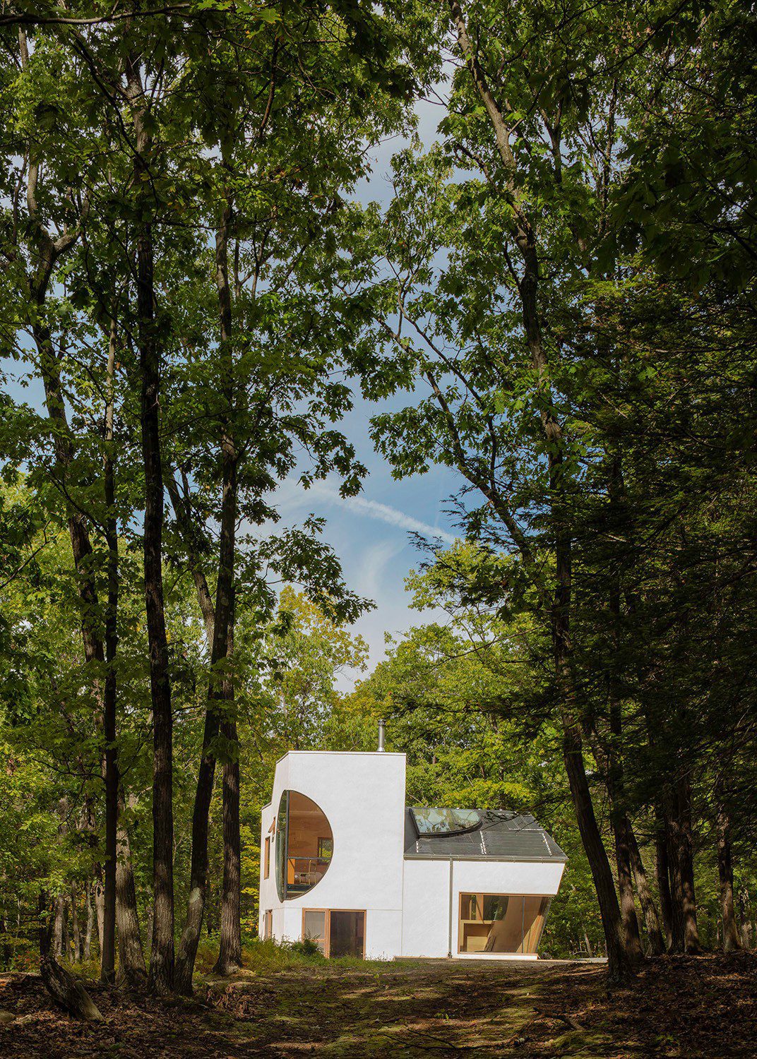 Steven Holl carves boolean voids from Ex of In House in New York state